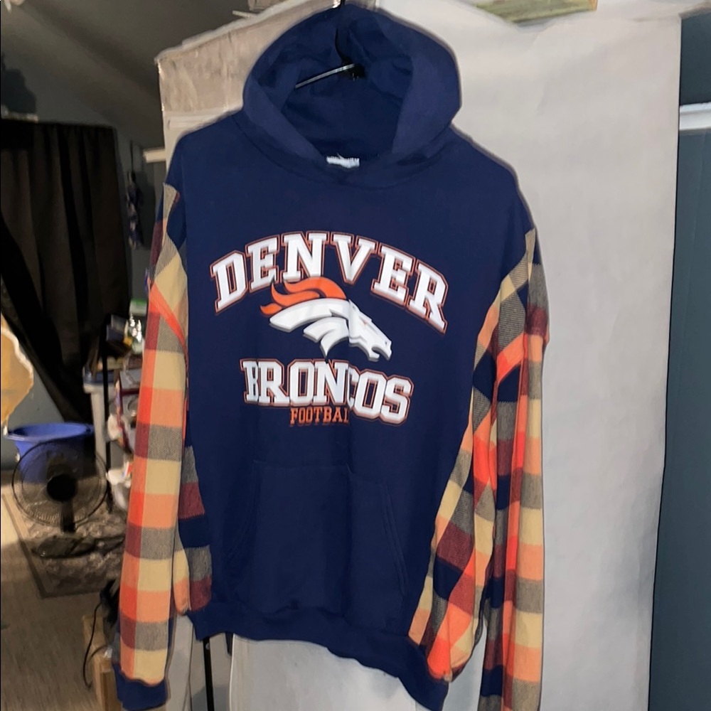 one of a kind Denver Broncos, hoodie/flannel. Used hoodie w/no tag Woman’s Large